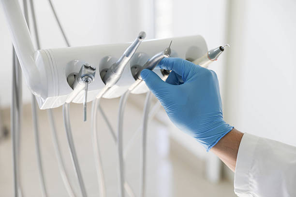 Professional Root Canal Treatment technician working in Union County County, NM